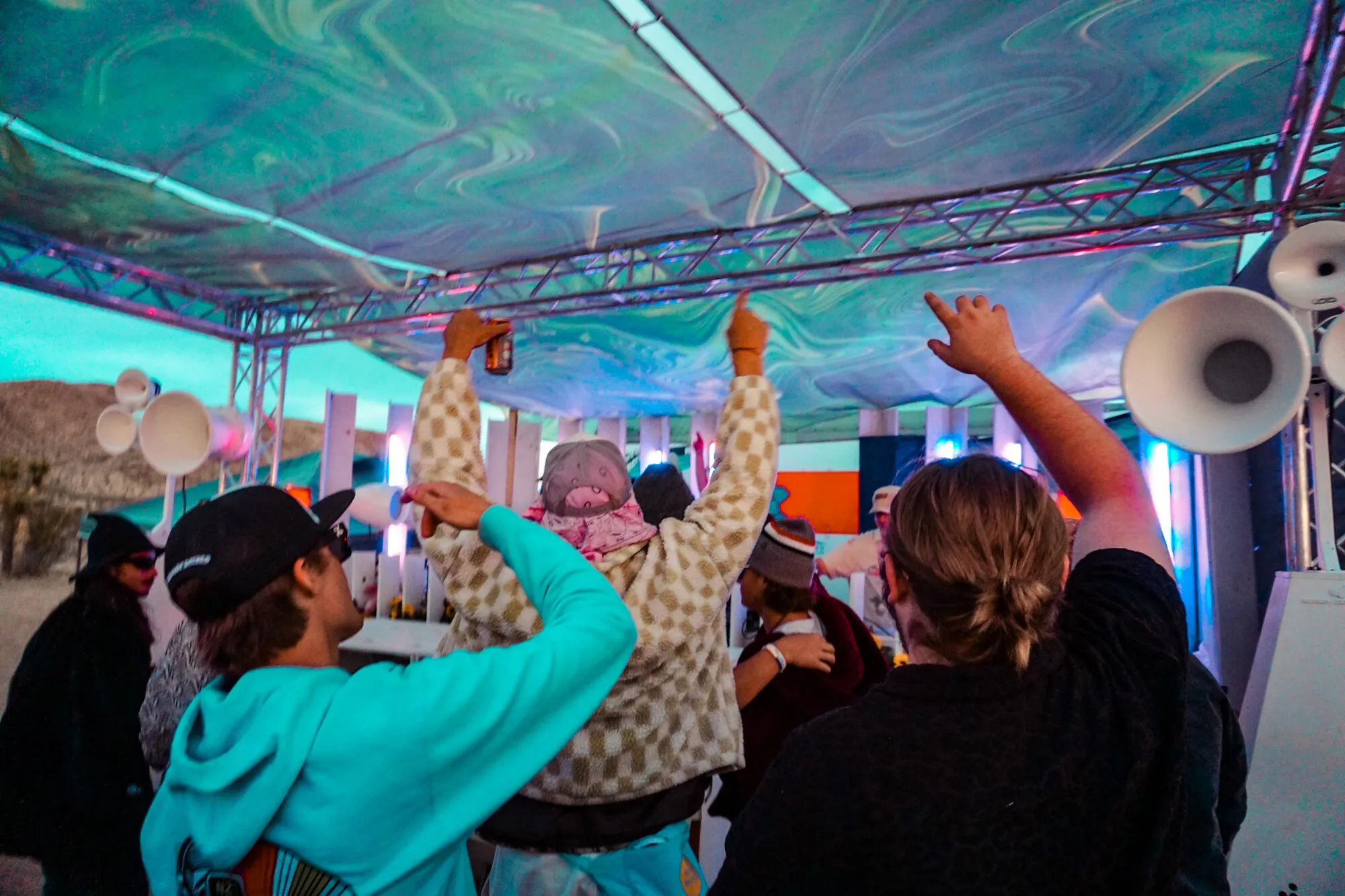 Crowd with hands up at the NZT stage