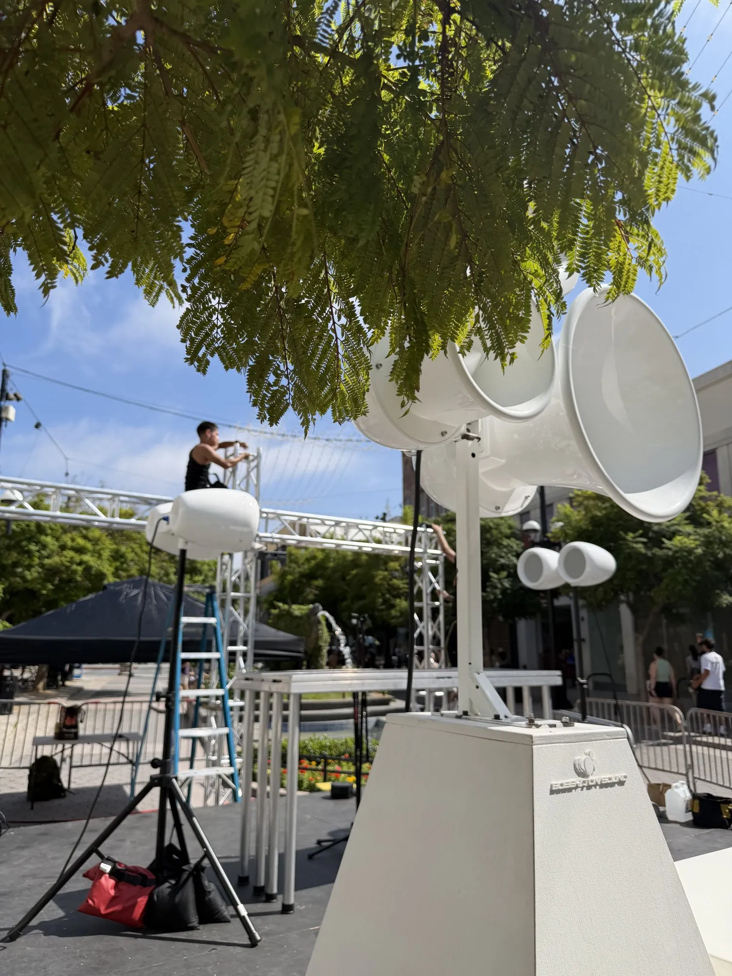 Air Motion horns above the street festival
