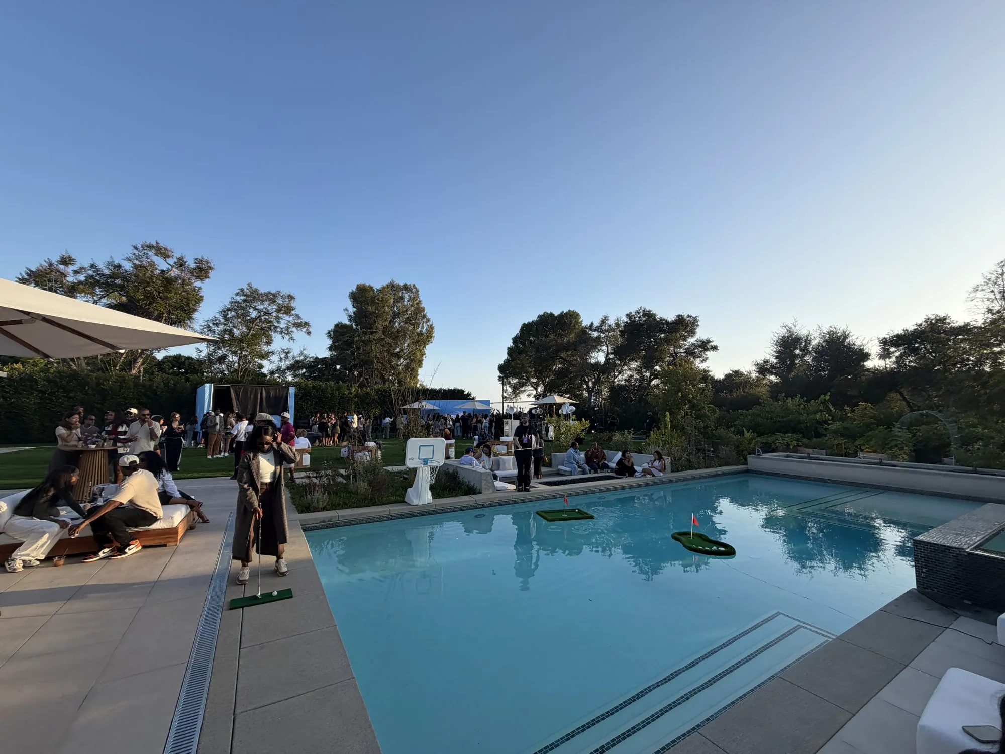 Guests around the pool during the afternoon set