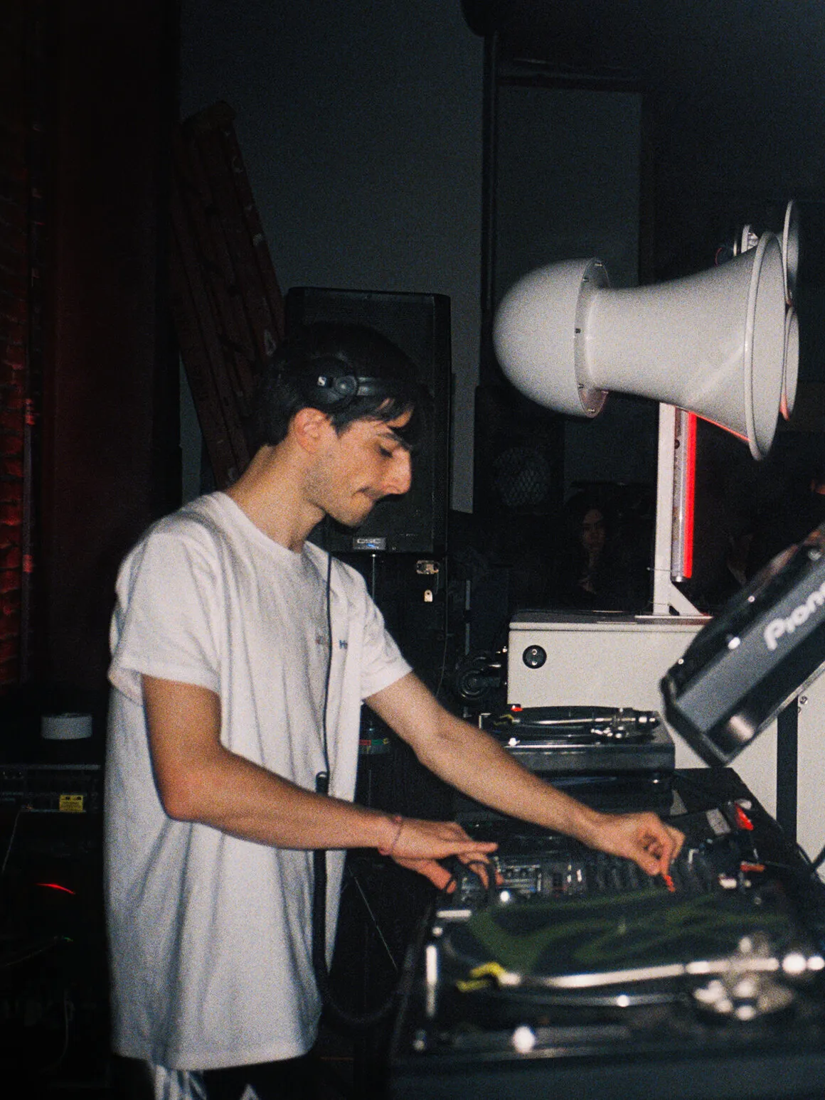 DJ at the booth beside Void horns